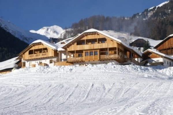Foto esterno in inverno Pension Odles