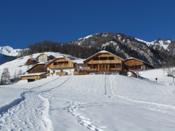 Foto esterno in inverno Pension Odles