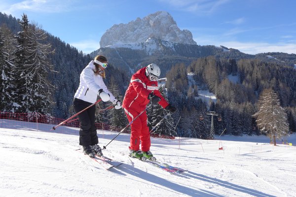 Scuola sci e snowboard Selva Val Gardena TradItDeEn [it=Selva Gardena, de=Wolkenstein, en=Selva Gardena / Wolkenstein]