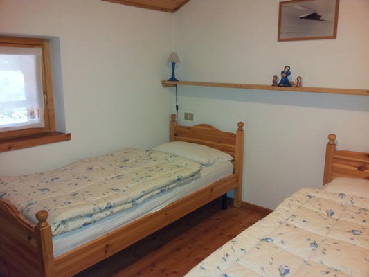 Foto vom Zimmer Ferienwohnungen Casa Fusine