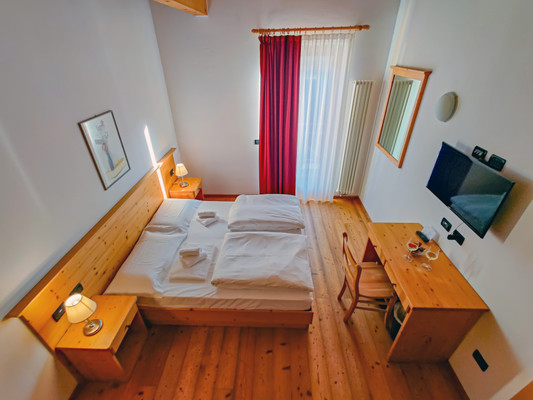 Foto della camera Camere + Appartamenti Dolomiti