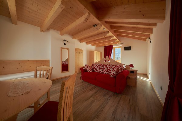 La zona giorno Abete Rosso Room & Restaurant