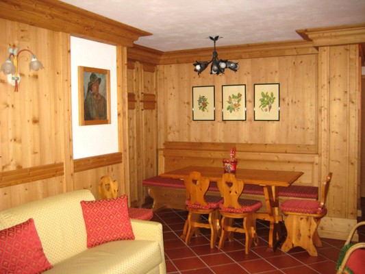 La zona giorno Appartamenti Chalet dei Pini