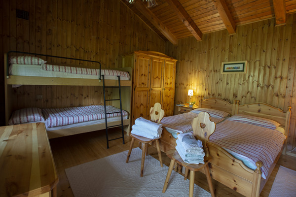 Foto vom Zimmer Ferienhaus Chalet Martignilas - La casa nel bosco