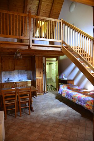 La zona giorno B&B + Appartamenti in agriturismo Pian dei Tass