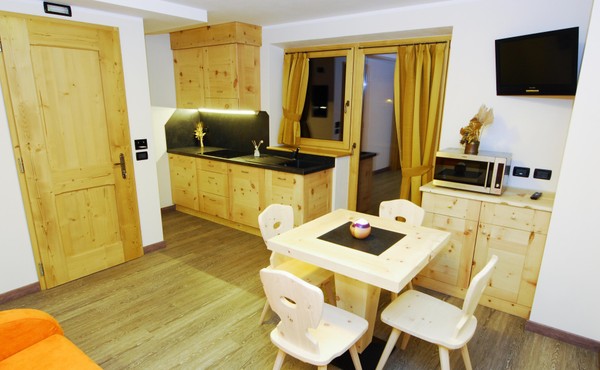 La zona giorno Residence Baita Cusini