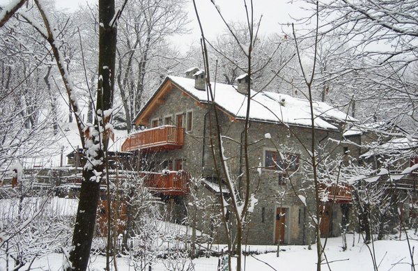 Foto invernale di presentazione L'eco - Camere in agriturismo