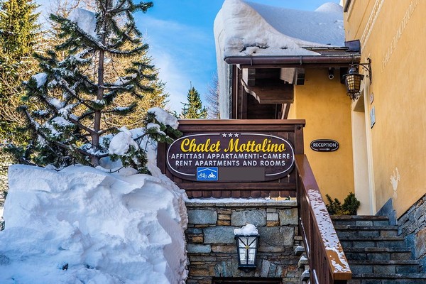 Foto Außenansicht Ferienwohnungen Chalet Mottolino