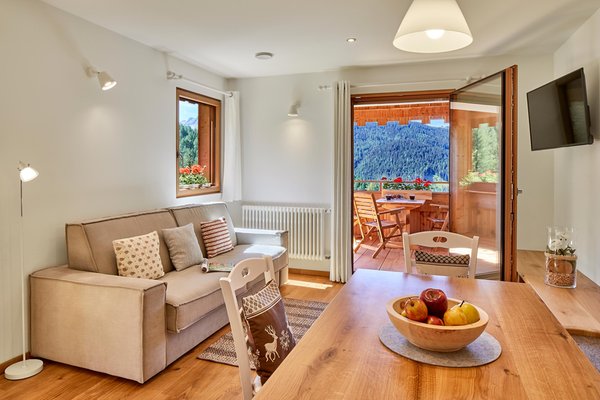 La zona giorno Appartamenti in agriturismo Lüch Rudiferia e La Morinara