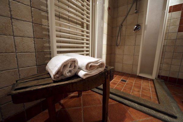 Foto del bagno Appartamenti La Meizon de Felise