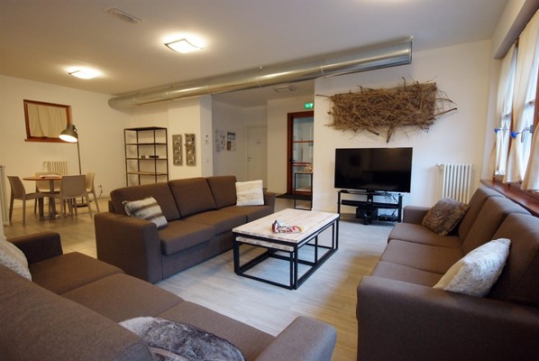 La zona giorno Residence RTA Villaggio delle Alpi