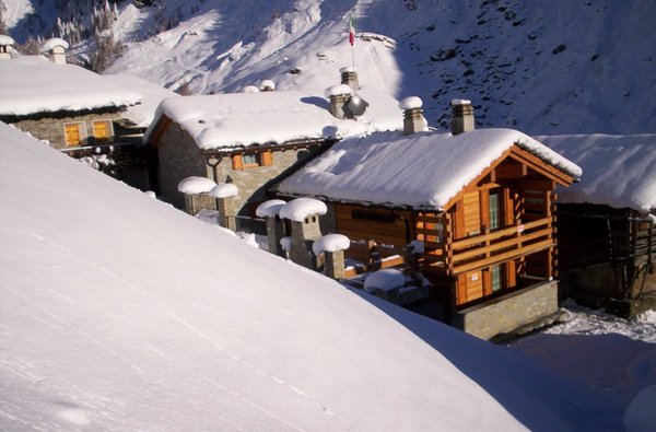 Foto esterno in inverno Chalet Volpi