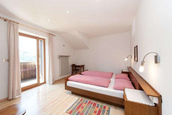 Foto vom Zimmer Ferienwohnungen Ciasa Saina