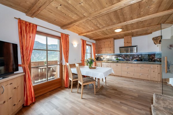 La zona giorno Pensione + Appartamenti in agriturismo Moarlhof