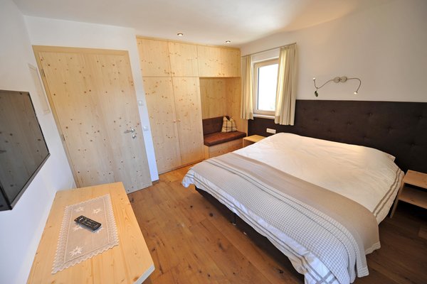 Foto vom Zimmer Ferienwohnungen Cesa Leni