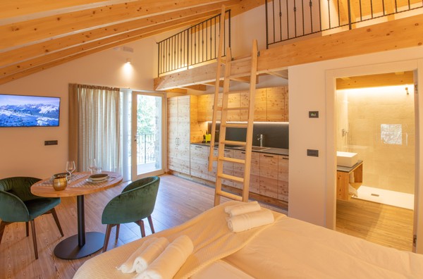 Der Wohnraum Brenta Rosso - Charme Apartments