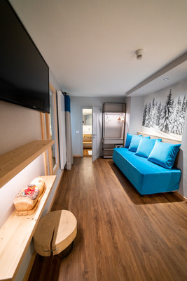 La zona giorno Hotel + Residence Al Sole - Mountain Chic
