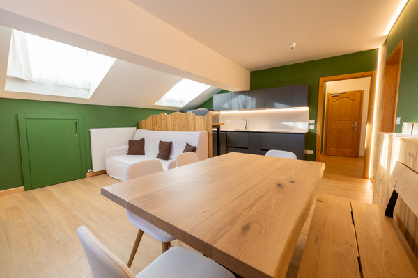 La zona giorno Hotel + Residence Al Sole - Mountain Chic