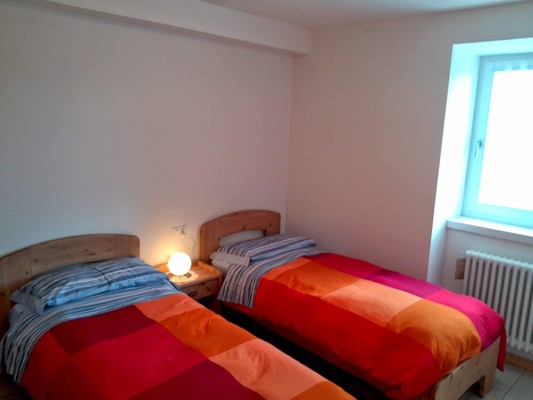 Foto vom Zimmer Ferienwohnungen Casa Pergher