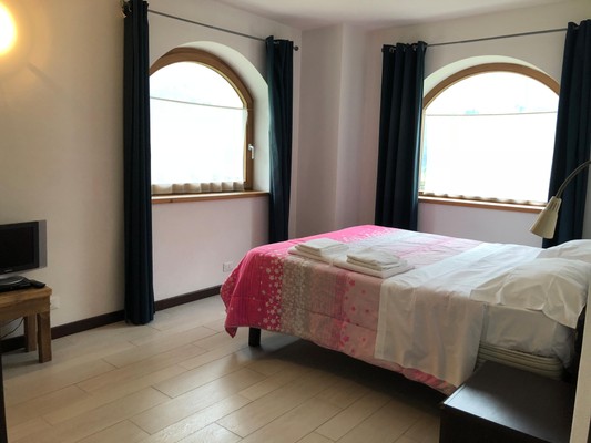 Foto vom Zimmer Ferienwohnung Romanin Stefania