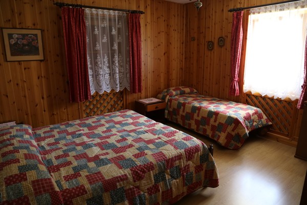 Foto vom Zimmer Ferienwohnungen Casa Genziana