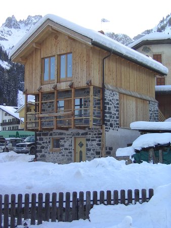 Foto esterno in inverno Chalet Royal