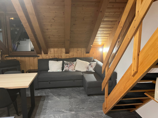 La zona giorno Appartamento Wooden Attic Titti
