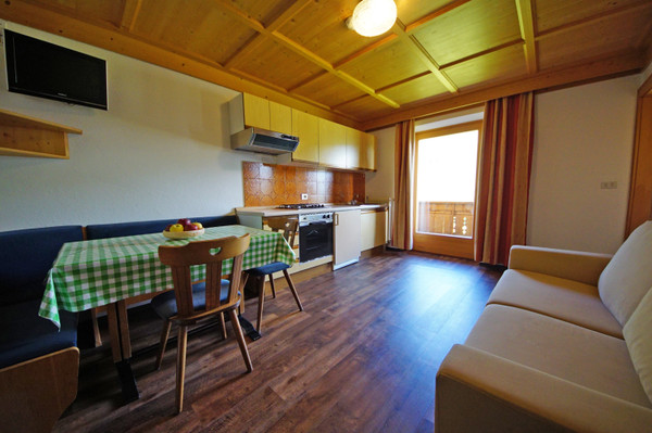 La zona giorno Pensione + Residence Arnica