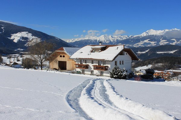Foto invernale di presentazione Appartamenti in agriturismo Beikircherhof
