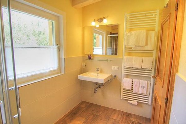 Foto del bagno Appartamenti in agriturismo Planhof