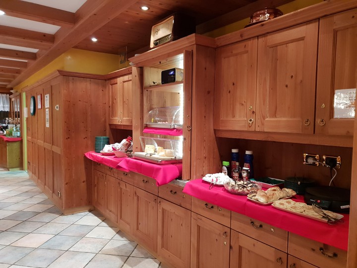 La colazione Chalets Dolomites Brigitte - Appartamenti & B&B